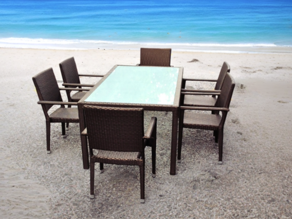 PANAMA OUTDOOR DINING TABLE features a sturdy aluminum frame, ensuring stability and longevity. The table is adorned with Rehau fiber woven around the frame